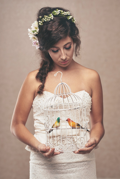 bride holding cage with two birds - Photo, Image