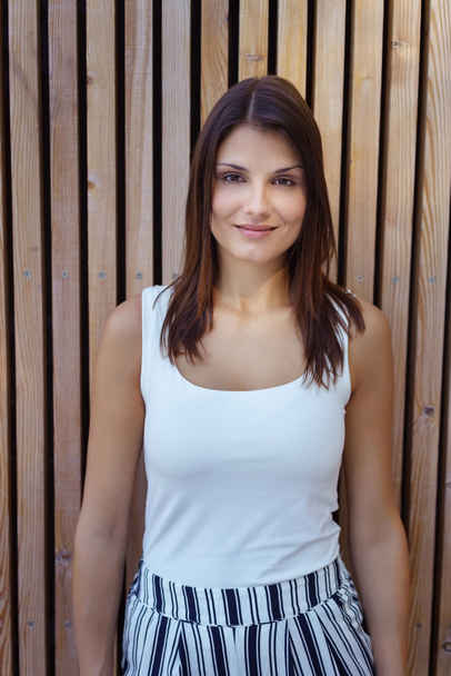 Woman in front of vertical background - Fotó, kép