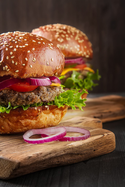 Closeup of home made beef burgers with lettuce and mayonnaise se - Fotografie, Obrázek
