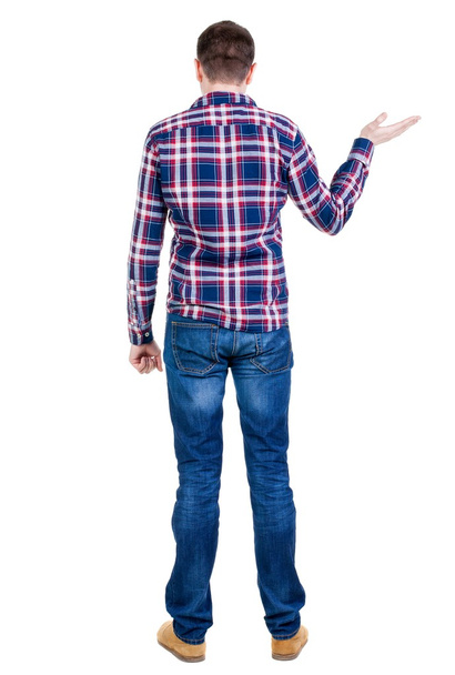 Back view of handsome man in checkered shirt keep on ha - Foto, Imagen