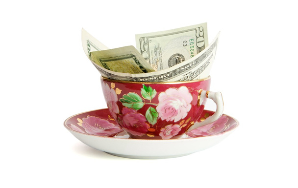 Tea cup with twenty dollar bills - Photo, Image