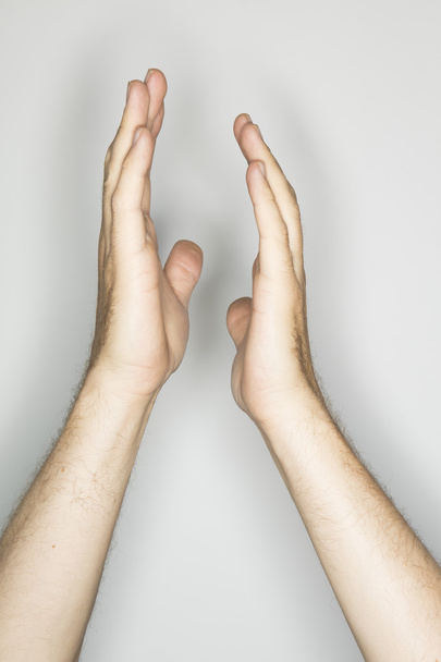 two caucasian hands in a gesture: clapping - Foto, afbeelding