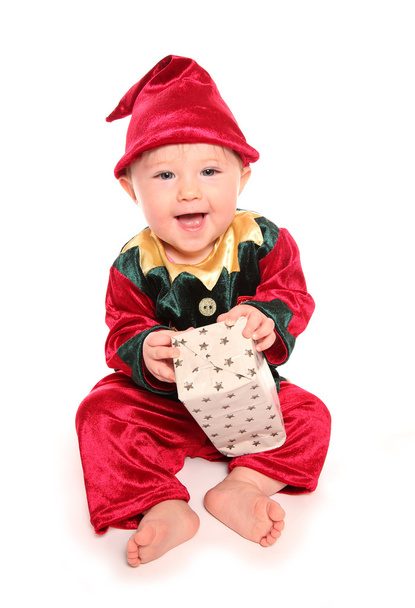 elfs サンタに小さなヘルパーの仮装衣装に身を包んだ幼児 - 写真・画像