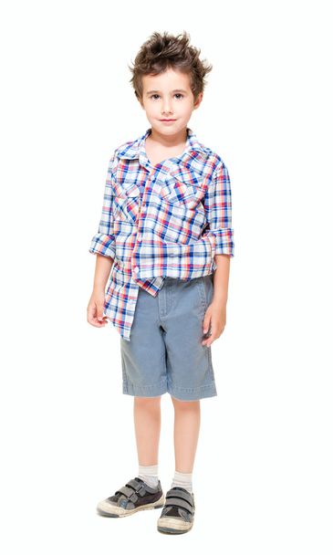 Naughty little boy in shorts and shirt - Фото, зображення