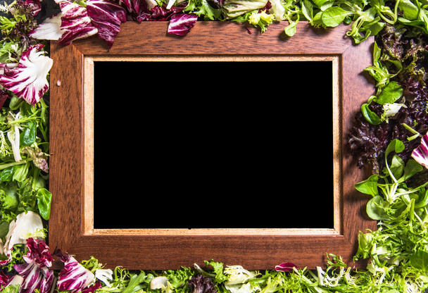 Empty board background with salad - Фото, зображення
