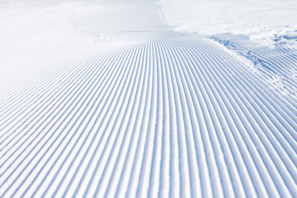 Snow lines made from a snow machine - Foto, Bild