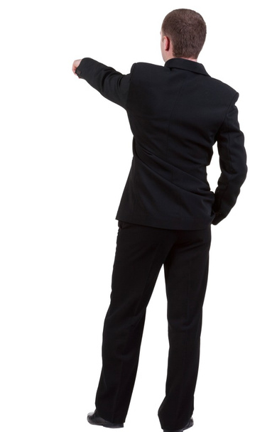 Back view of pointing business man. - Zdjęcie, obraz