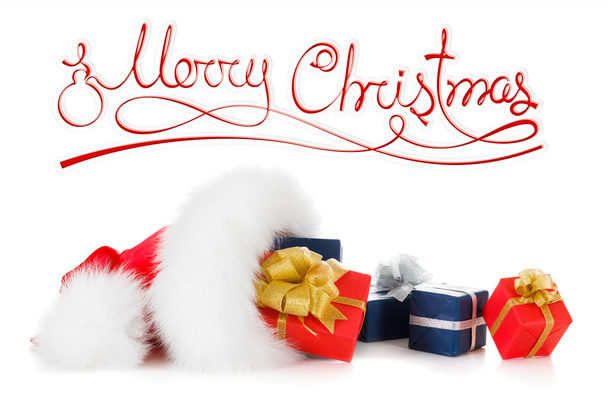 Merry Christmas text, red santa hat with gift - Фото, зображення