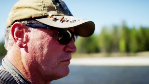 fisherman casting line in freshwater river - Footage, Video