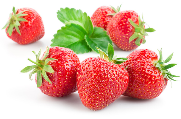 Strawberries with leaves. Isolated on a white background. - Φωτογραφία, εικόνα