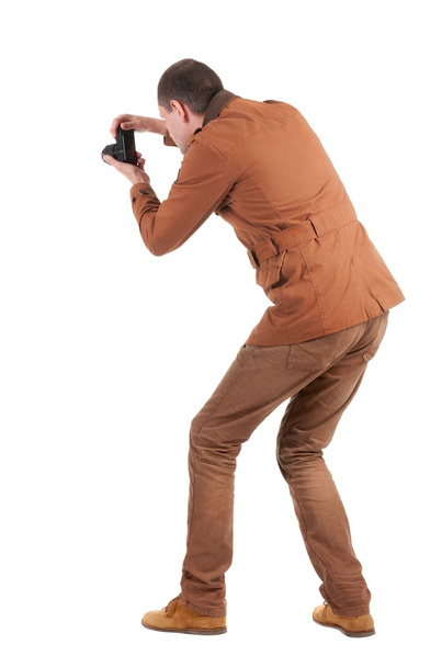 Back view of man photographing - Foto, afbeelding