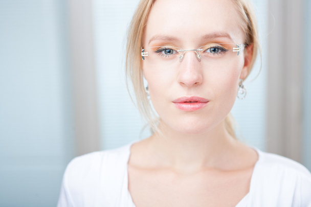 Young woman wearing glasses - Фото, изображение