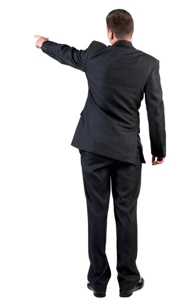 Back view of pointing business man. - Фото, зображення