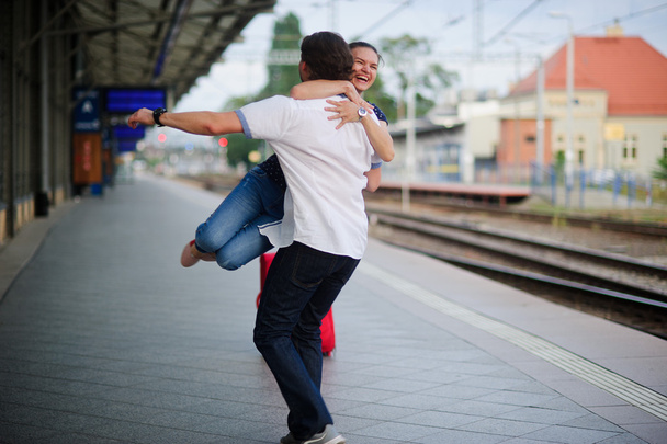 Joyful meeting at the railway station. - Photo, image