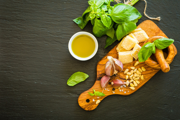 Pesto sauceingredients on wood board - Foto, imagen