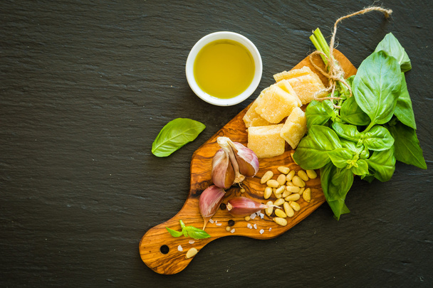 Pesto sauceingredients on wood board - Foto, afbeelding