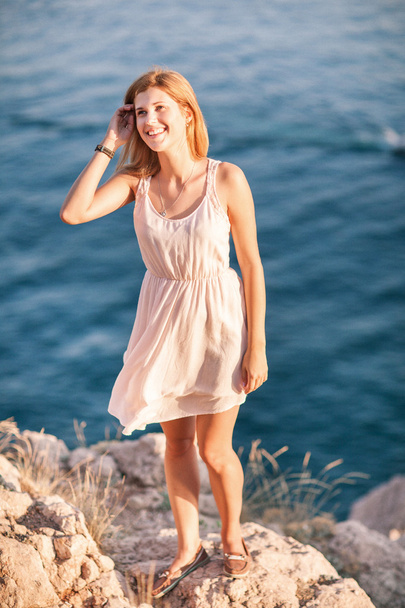 lifestyle concept - beautiful happy woman enjoying summer outdoors - Photo, Image