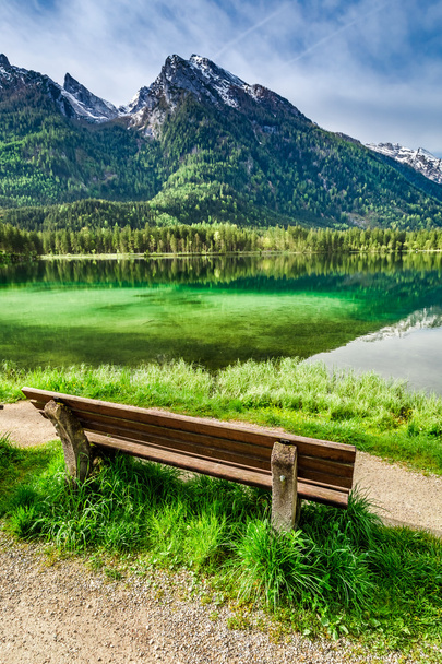 Small bench at the Hintersee lake at sunrise - Fotoğraf, Görsel