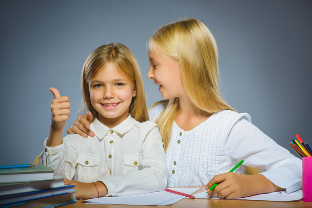 school concept. Closeup portrait successful happy girls drawing pencil - Фото, изображение