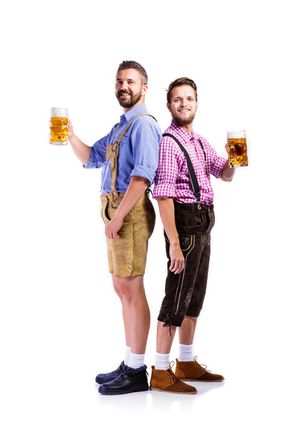 Men in bavarian clothes with beer - Foto, Imagen