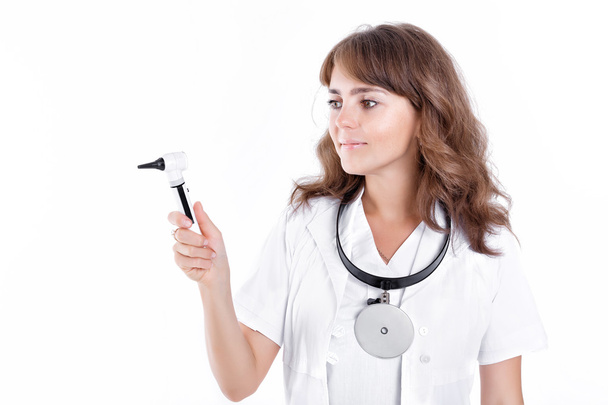 Doctor ENT is holding the Otoscope  - Photo, Image