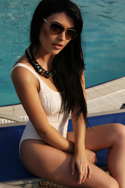  gorgeous sexy woman with dark hair in elegant swimsuit  - Zdjęcie, obraz