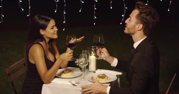 Happy loving couple toasting each other - Footage, Video