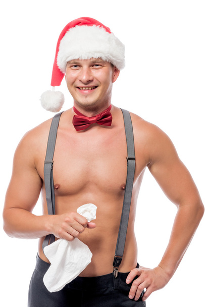 waiter stripper in a cap of Santa Claus with a napkin on white b - Valokuva, kuva