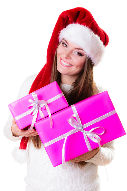 Woman santa helper hat with many pink gift boxes - Φωτογραφία, εικόνα