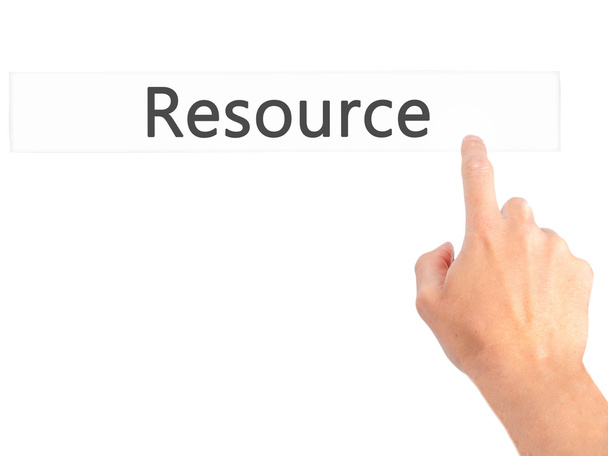 Resource - Hand pressing a button on blurred background concept  - Photo, Image