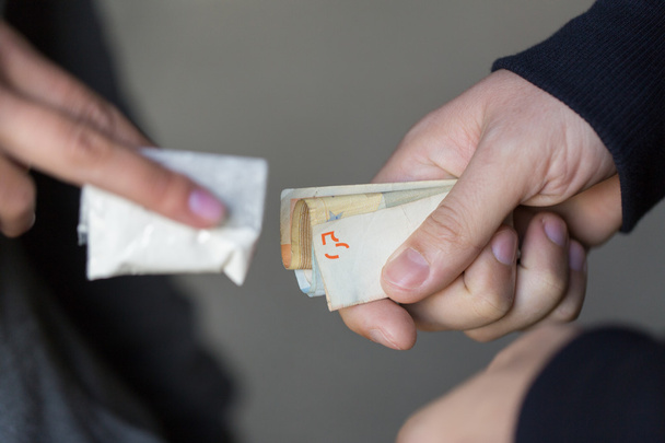 close up of addict buying dose from drug dealer - Foto, Imagem