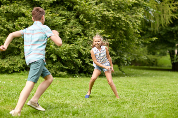 happy kids running and playing game outdoors - 写真・画像