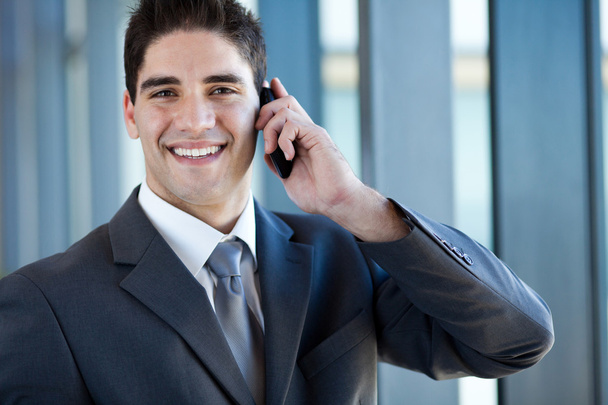 Happy successful young business man talking on cell phone - Φωτογραφία, εικόνα