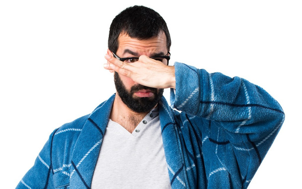 Man in dressing gown making smelling bad gesture - Photo, Image