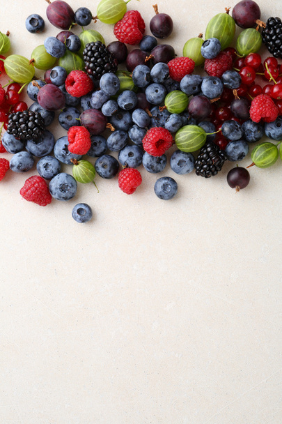 Fresh berries mix on concrete - Фото, изображение