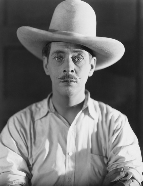 Portrait of man wearing cowboy hat - Photo, Image