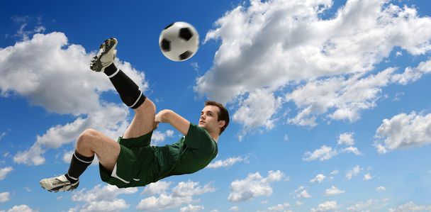 Soccer Player Kicking Ball - Fotó, kép