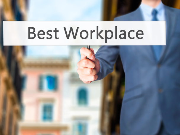 Best Workplace - Businessman hand holding sign - Photo, Image