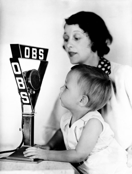 Baby and mother with radio microphone - Zdjęcie, obraz