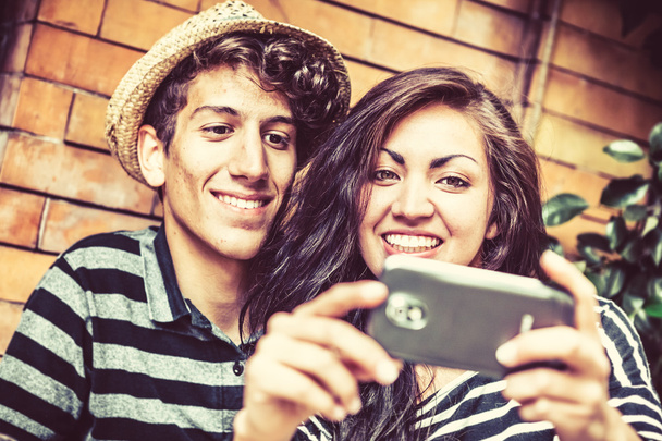 Couple taking selfie on mobile phone   - Zdjęcie, obraz