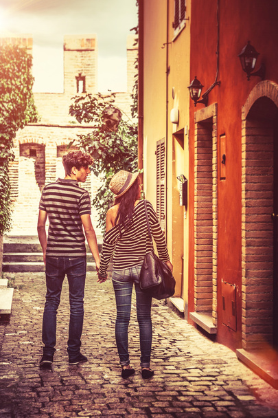 Couple walking on the street - Photo, image