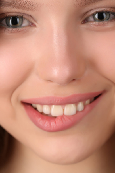 Model with makeup biting her lip. Close up - Fotografie, Obrázek