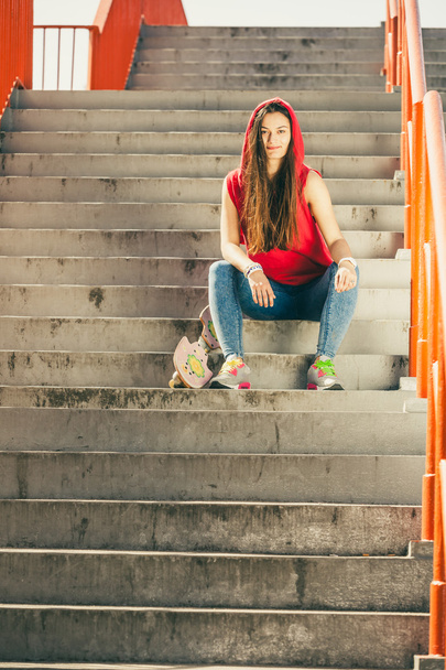 Skate girl on stairs with skateboard. - Photo, image