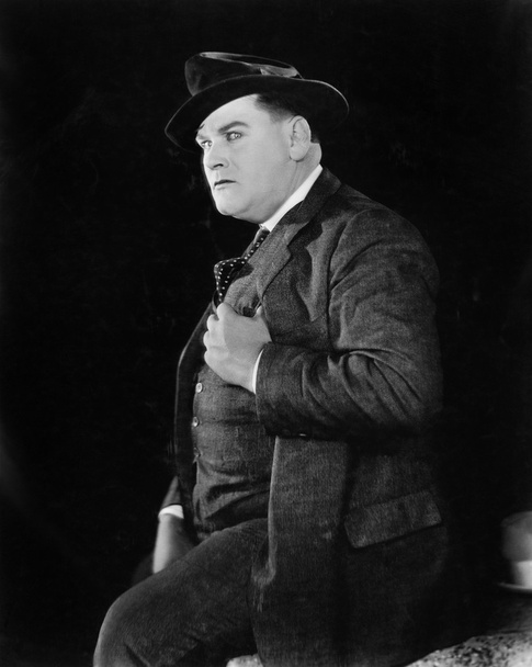 πορτρέτο ενός ανθρώπου σε καπέλο και κοστούμι - Φωτογραφία, εικόνα