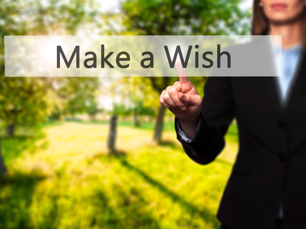 Make a Wish - Businesswoman pressing modern  buttons on a virtua - Photo, Image