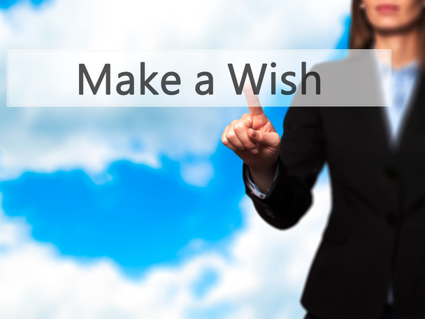 Make a Wish - Businesswoman pressing modern  buttons on a virtua - Photo, Image