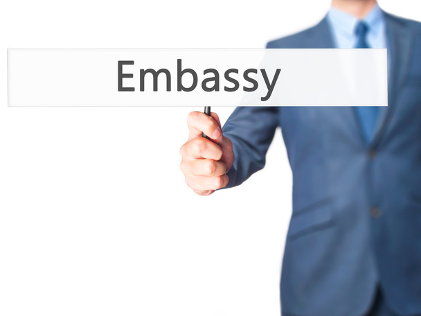 大使館 - ビジネスマンハンドホールディングサイン - 写真・画像