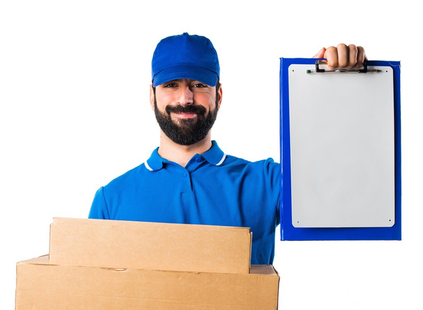Delivery man with folder - Foto, immagini