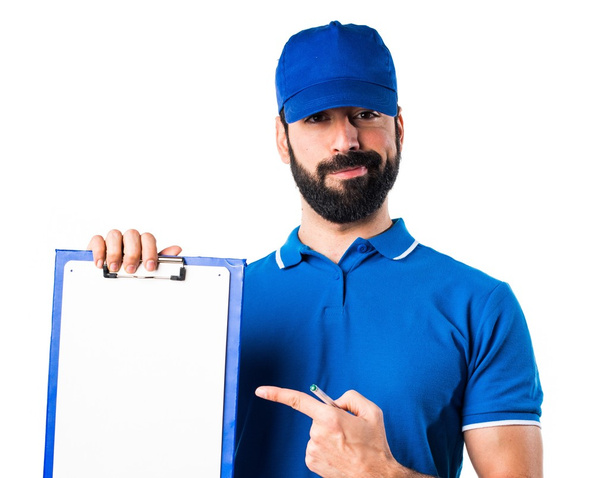 Delivery man with folder - Foto, imagen