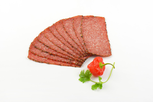 Tranches de salami au poivre noir
 - Photo, image
